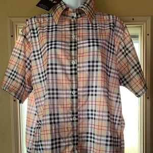 Brand new with tag. Unisex short/set with printed Burberry on it.